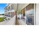 This balcony overlooks the waterfront with the sliding glass doors providing natural light at 919 Seddon Cove Way # 919, Tampa, FL 33602