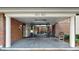Elegant covered building entrance featuring decorative iron gates and brick facade at 919 Seddon Cove Way # 919, Tampa, FL 33602