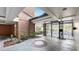 Building entrance with ornate metal gates, brick accents, and landscaping at 919 Seddon Cove Way # 919, Tampa, FL 33602