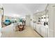 Bright living room boasts mirrored wall, built-in bar and access to balcony with beautiful views at 919 Seddon Cove Way # 919, Tampa, FL 33602