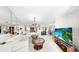 This large living room includes a mirrored wall, an open layout and easy access to other rooms at 919 Seddon Cove Way # 919, Tampa, FL 33602