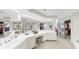 Large main bathroom with double sinks, mirrors, and walk-in closet at 919 Seddon Cove Way # 919, Tampa, FL 33602