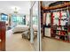 Bright main bedroom with balcony access that leads to a large walk-in closet at 919 Seddon Cove Way # 919, Tampa, FL 33602