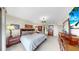 Well-lit main bedroom with sports memorabilia and a view of the waterfront at 919 Seddon Cove Way # 919, Tampa, FL 33602