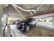 Pristine Cadillac Escalade parked in an underground parking garage with a water pipe-lined ceiling at 919 Seddon Cove Way # 919, Tampa, FL 33602