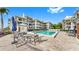 Inviting pool with outdoor seating and manicured landscaping at 919 Seddon Cove Way # 919, Tampa, FL 33602