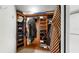 Large, corner walk-in closet offers many storage options at 919 Seddon Cove Way # 919, Tampa, FL 33602