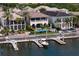 Breathtaking aerial view of luxury waterfront homes, docks, boats, and beautiful landscaping at 927 Anchorage Rd, Tampa, FL 33602