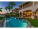 Stunning waterfront property with a pool, spa, and lush landscaping, ideal for outdoor living at 927 Anchorage Rd, Tampa, FL 33602