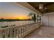 Elegant balcony view of waterfront property featuring manicured landscaping and private docks at 927 Anchorage Rd, Tampa, FL 33602