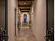Inviting hallway features tiled floors, neutral walls, and a decorative ceiling with an ornate light fixture at 927 Anchorage Rd, Tampa, FL 33602