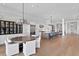 Open concept kitchen with modern appliances, large island, and breakfast nook at 927 Anchorage Rd, Tampa, FL 33602