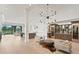 Spacious open-concept living room and kitchen with modern lighting and decor at 927 Anchorage Rd, Tampa, FL 33602