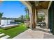 Inviting outdoor patio with waterfront views, complete with outdoor seating and lush landscaping at 927 Anchorage Rd, Tampa, FL 33602