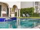 Stunning pool and outdoor space featuring blue tile accents and comfortable lounge seating at 927 Anchorage Rd, Tampa, FL 33602