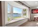 Inviting window seat in a bay window with water views at 935 Eden Isle Ne Dr, St Petersburg, FL 33704