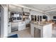 Outdoor kitchen featuring stainless steel appliances, granite countertops, and ample counter space at 935 Eden Isle Ne Dr, St Petersburg, FL 33704