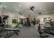 Community gym featuring weight machines, treadmills, and floor-to-ceiling windows for natural light at 9396 Minnow Ray Dr, Land O Lakes, FL 34638