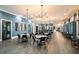 The community lounge provides an open floor plan, comfortable seating, and a bar at 9396 Minnow Ray Dr, Land O Lakes, FL 34638