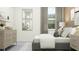 Bright bedroom with ample storage, large window, and tasteful décor for a restful retreat at 9396 Minnow Ray Dr, Land O Lakes, FL 34638