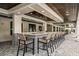A gorgeous outdoor bar with custom tile work and plenty of seating makes this a great place to hang out at 9396 Minnow Ray Dr, Land O Lakes, FL 34638