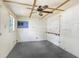Empty room with a ceiling fan and exposed ceiling beams at 10130 Burton St, New Port Richey, FL 34654