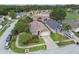 An elevated view showcases the home's landscaping and curb appeal within the residential neighborhood at 10223 Charleston Corner Rd, Tampa, FL 33635