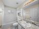 Bathroom featuring a bath, shower, sink and vanity with granite countertop at 10324 Chatuge Dr, San Antonio, FL 33576