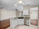 Kitchen area boasts stainless steel appliances, granite countertops, and sleek finishes at 10324 Chatuge Dr, San Antonio, FL 33576