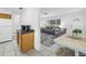 Open kitchen layout with tile flooring, seamlessly connecting to the living room and dining area for easy entertaining at 11315 86Th Ave, Seminole, FL 33772