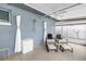 Covered patio with curtains, shower, ceiling fan, and seating area at 11315 86Th Ave, Seminole, FL 33772