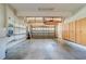Spacious two car garage with built-in shelves and storage cabinets at 11386 Churchhill Trl, Seminole, FL 33772