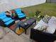 Inviting backyard patio featuring comfortable seating, a modern coffee table, and colorful accent pillows at 1142 56Th N Ave, St Petersburg, FL 33703