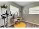 Bright bedroom featuring a vanity with a round yellow rug, perfect for personal care and exercise at 1142 56Th N Ave, St Petersburg, FL 33703