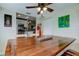 Charming dining room with a wooden table and view into the kitchen at 1142 56Th N Ave, St Petersburg, FL 33703