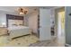 Bright bedroom with a comfortable bed, closet, and modern flooring, offering a peaceful retreat at 1142 56Th N Ave, St Petersburg, FL 33703