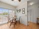 Bright breakfast nook with a glass table and a view of the outside scenery at 11510 Shipwatch Dr # 1375, Largo, FL 33774
