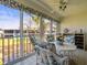 Screened in lanai featuring seating and view of canal at 11510 Shipwatch Dr # 1375, Largo, FL 33774