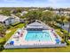 Community pool with hot tub, lounge chairs, and a shaded pavilion at 11510 Shipwatch Dr # 1375, Largo, FL 33774