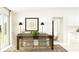Bright dining room with modern chairs, a wooden table, and stylish decor at 11860 Blue Diamond Trl, Parrish, FL 34219