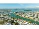 Scenic aerial view of a waterfront property near the bay and local amenities at 12412 Lagoon Ln, Treasure Island, FL 33706