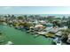Waterfront home with a private dock and boat lift, providing direct access to the ocean at 12412 Lagoon Ln, Treasure Island, FL 33706