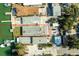 Aerial view of a waterfront property featuring a private dock with direct access to the canal at 12412 Lagoon Ln, Treasure Island, FL 33706