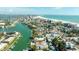 Waterfront homes near a beautiful beach and a vibrant coastal community at 12412 Lagoon Ln, Treasure Island, FL 33706