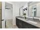 Beautiful bathroom with double vanity, modern fixtures, and ample storage, offering a serene and functional space at 12707 Green Heron Way, Odessa, FL 33556
