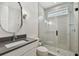 Clean and modern bathroom with a glass-enclosed shower and a sleek vanity at 12707 Green Heron Way, Odessa, FL 33556