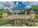 Entrance to the Eagles, a golf and gated community with lush landscaping and stone signage at 12707 Green Heron Way, Odessa, FL 33556