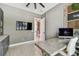 Spacious office featuring custom built-ins, desk and decorative wall art at 12707 Green Heron Way, Odessa, FL 33556