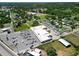 A birds-eye view reveals lush trees dotting the landscape, creating a serene and green community at 14734 11Th St, Dade City, FL 33523
