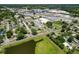 Aerial view of the neighborhood showing nearby highways and businesses at 14734 11Th St, Dade City, FL 33523